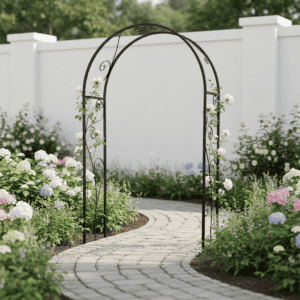 Garden arch with white flowering plants and a stone pathway in a lush garden setting.
