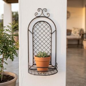 Wrought iron potholder with basket.