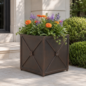 Lush garden entrance with vibrant flowers in Belle Jardin Planter - LArge